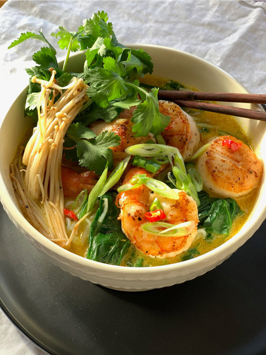 YELLOW THAI CURRY SOUP WITH SEAFOOD, SPINACH & NOODLES